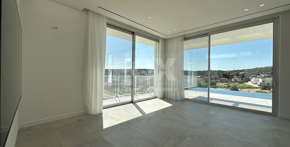 MODERN 6 BEDROOM 5 BATHROOM FURNISHED VILLA IN AN ELEVATED PART OF AGIOS TYCHONAS WITH LOVELY VIEWS