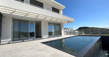 MODERN 6 BEDROOM 5 BATHROOM FURNISHED VILLA IN AN ELEVATED PART OF AGIOS TYCHONAS WITH LOVELY VIEWS