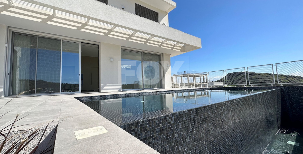 MODERN 6 BEDROOM 5 BATHROOM FURNISHED VILLA IN AN ELEVATED PART OF AGIOS TYCHONAS WITH LOVELY VIEWS