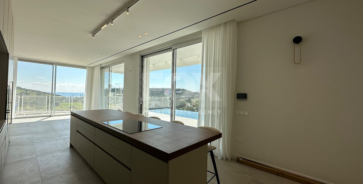 MODERN 6 BEDROOM 5 BATHROOM FURNISHED VILLA IN AN ELEVATED PART OF AGIOS TYCHONAS WITH LOVELY VIEWS