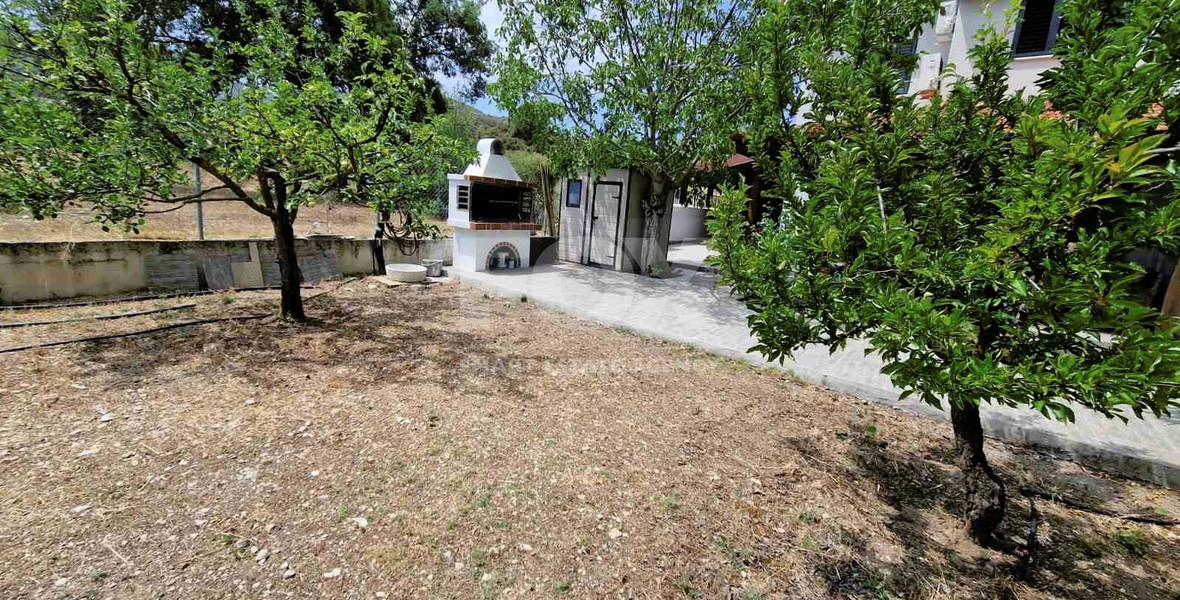 Beautiful three-bedroom house with big garden and common swimming pool in Mandria, Limassol