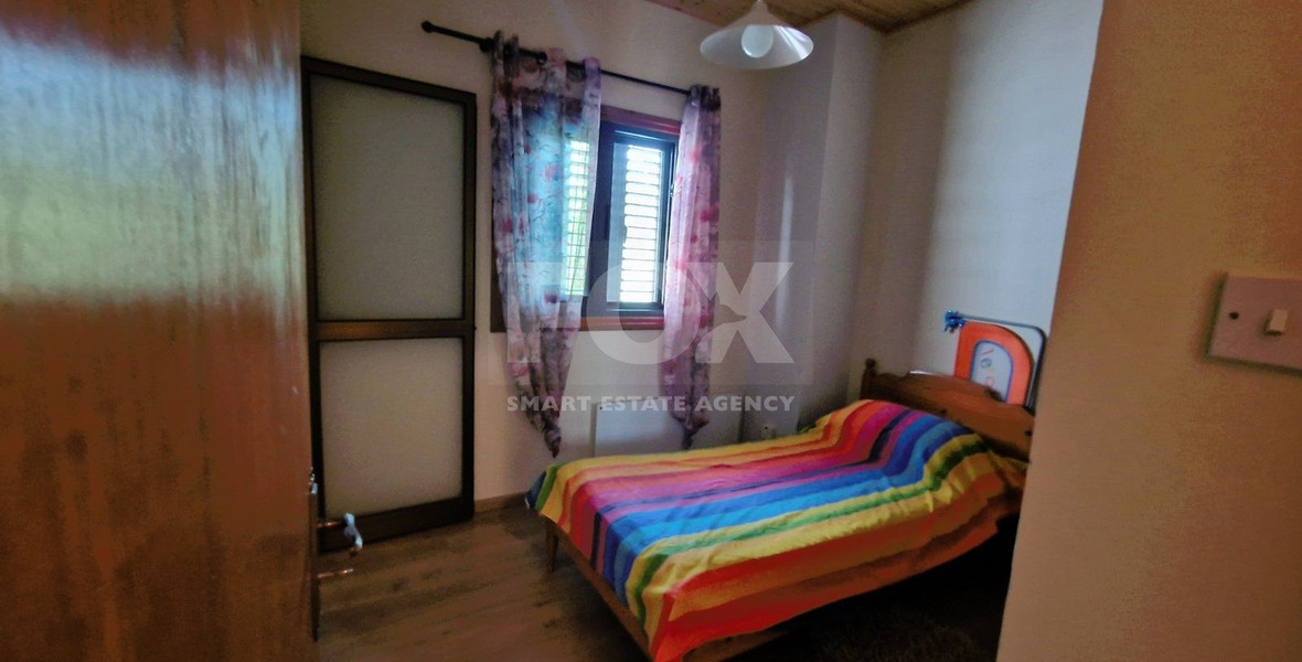 Beautiful three-bedroom house with big garden and common swimming pool in Mandria, Limassol