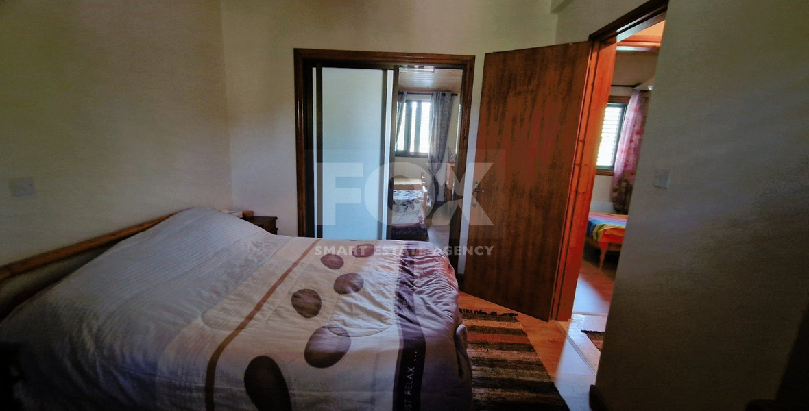 Beautiful three-bedroom house with big garden and common swimming pool in Mandria, Limassol