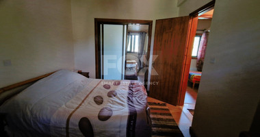 Beautiful three-bedroom house with big garden and common swimming pool in Mandria, Limassol