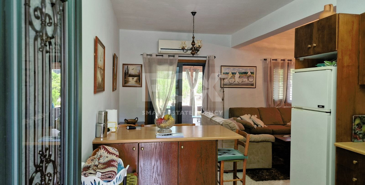 Beautiful three-bedroom house with big garden and common swimming pool in Mandria, Limassol