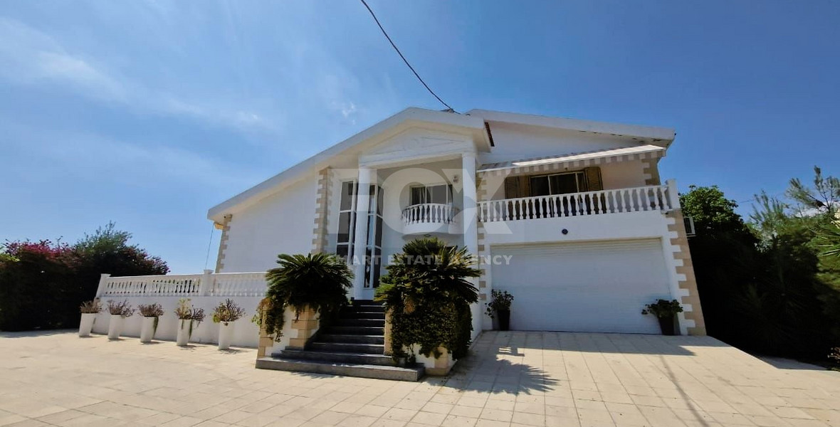 Elegant Villa for sale in Parekklisia: with Expansive Garden, Swimming Pool and Sea Views