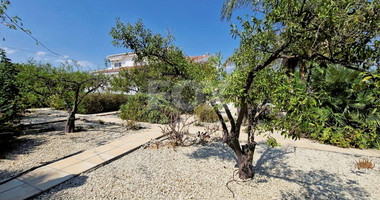 Elegant Villa for sale in Parekklisia: with Expansive Garden, Swimming Pool and Sea Views