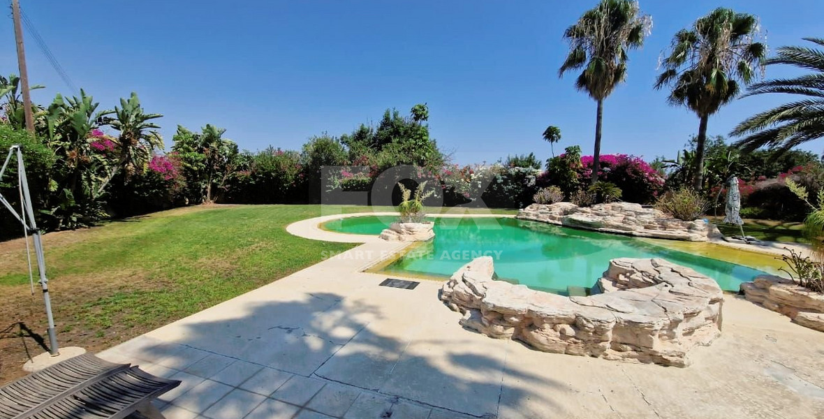 Elegant Villa for sale in Parekklisia: with Expansive Garden, Swimming Pool and Sea Views