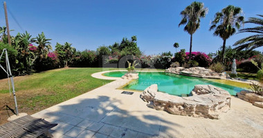 Elegant Villa for sale in Parekklisia: with Expansive Garden, Swimming Pool and Sea Views