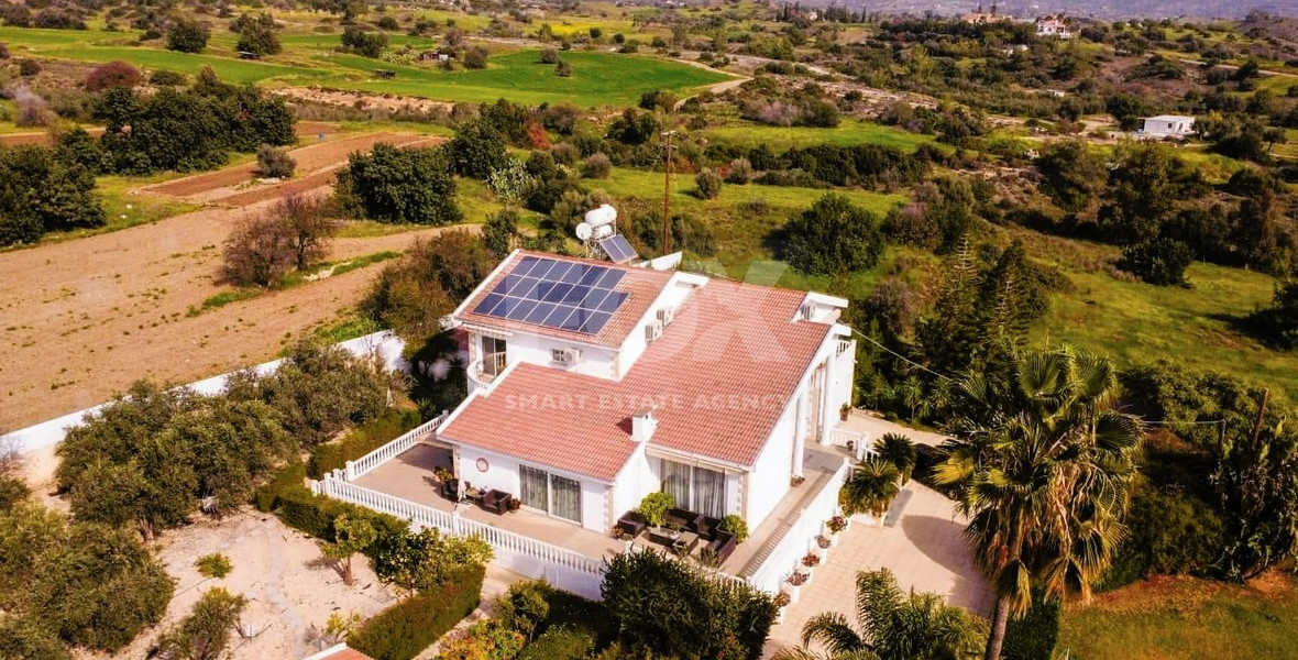 Elegant Villa for sale in Parekklisia: with Expansive Garden, Swimming Pool and Sea Views