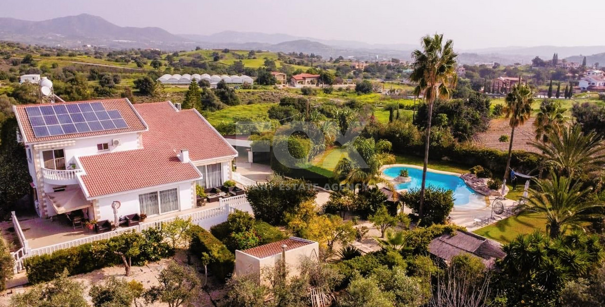 Elegant Villa for sale in Parekklisia: with Expansive Garden, Swimming Pool and Sea Views