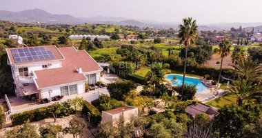 Elegant Villa for sale in Parekklisia: with Expansive Garden, Swimming Pool and Sea Views