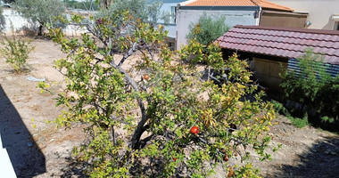 Large Residential Building Plot with House for Sale in Mesa Geitonia