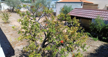 Large Residential Building Plot with House for Sale in Mesa Geitonia