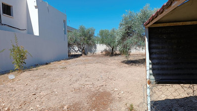 Large Residential Building Plot with House for Sale in Mesa Geitonia