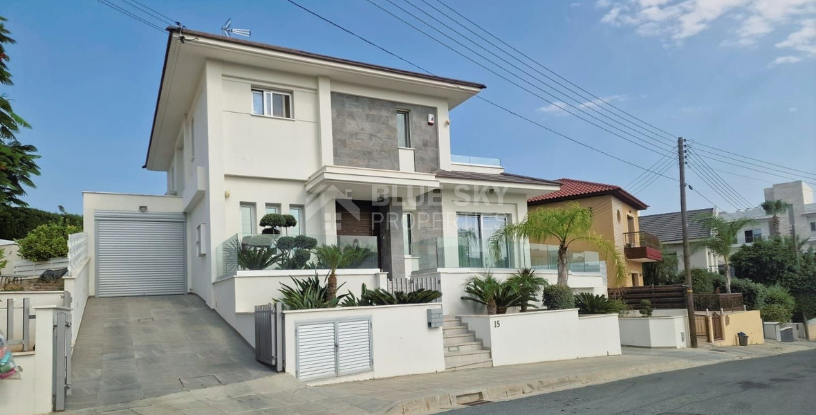 Luxurious five bedroom detached house with garden and swimming pool for sale in Agios athanasios