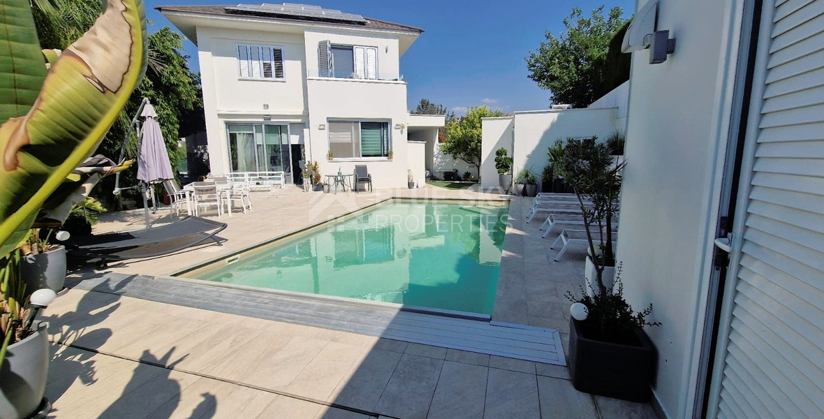 Luxurious five bedroom detached house with garden and swimming pool for sale in Agios athanasios