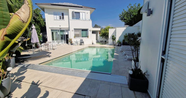 Luxurious five bedroom detached house with garden and swimming pool for sale in Agios athanasios