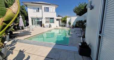 Luxurious five bedroom detached house with garden and swimming pool for sale in Agios athanasios