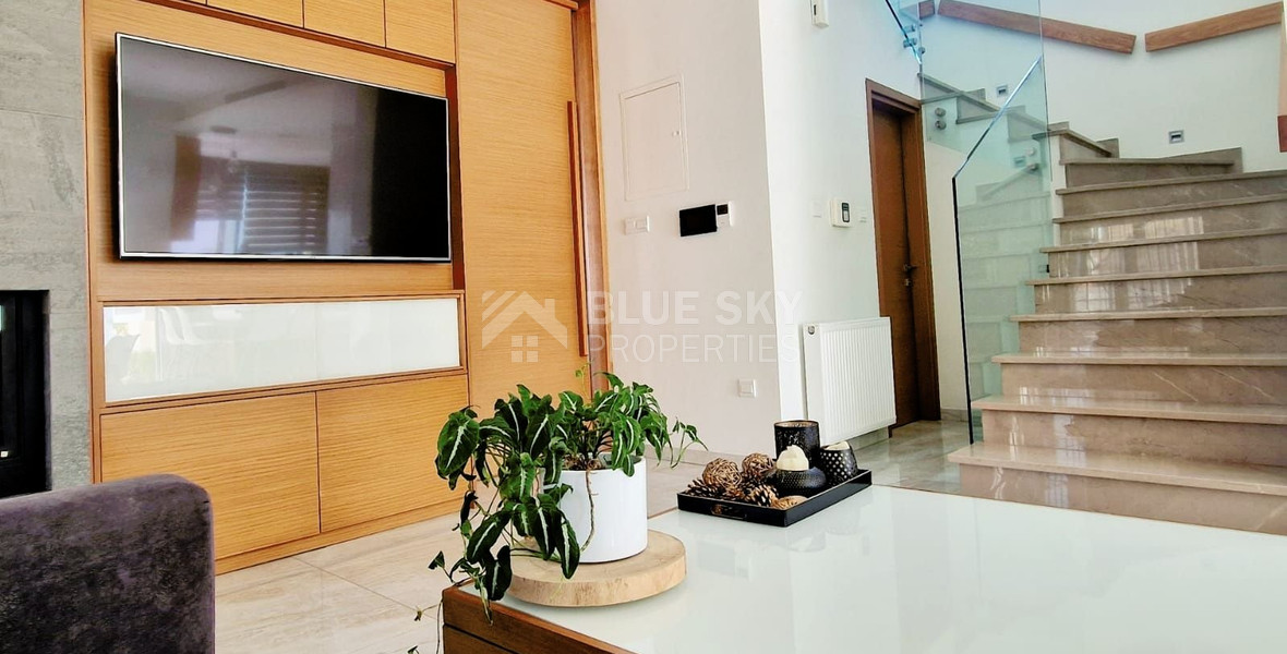 Luxurious five bedroom detached house with garden and swimming pool for sale in Agios athanasios