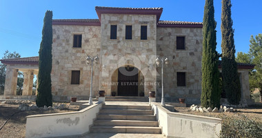 Exquisite  5 bedroom stone villa with 2 bedroom guest house  privately secluded and gated  on 13,118 sqm land in Moni.