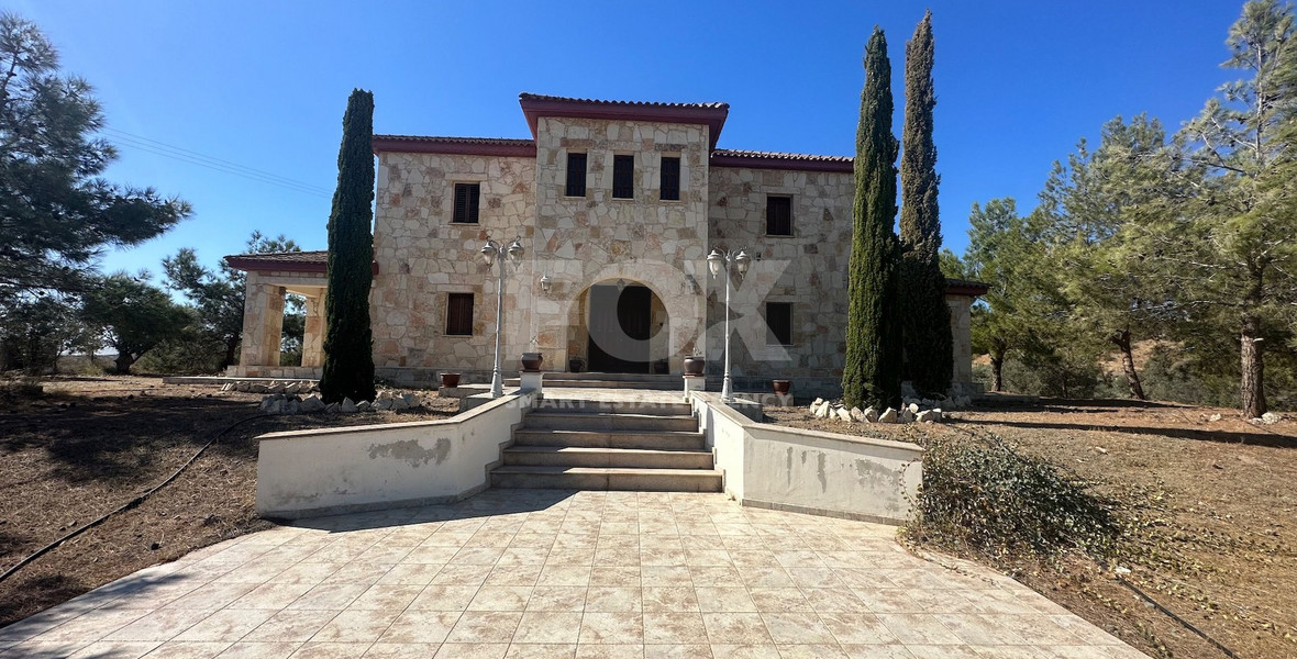 Exquisite  5 bedroom stone villa with 2 bedroom guest house  privately secluded and gated  on 13,118 sqm land in Moni.