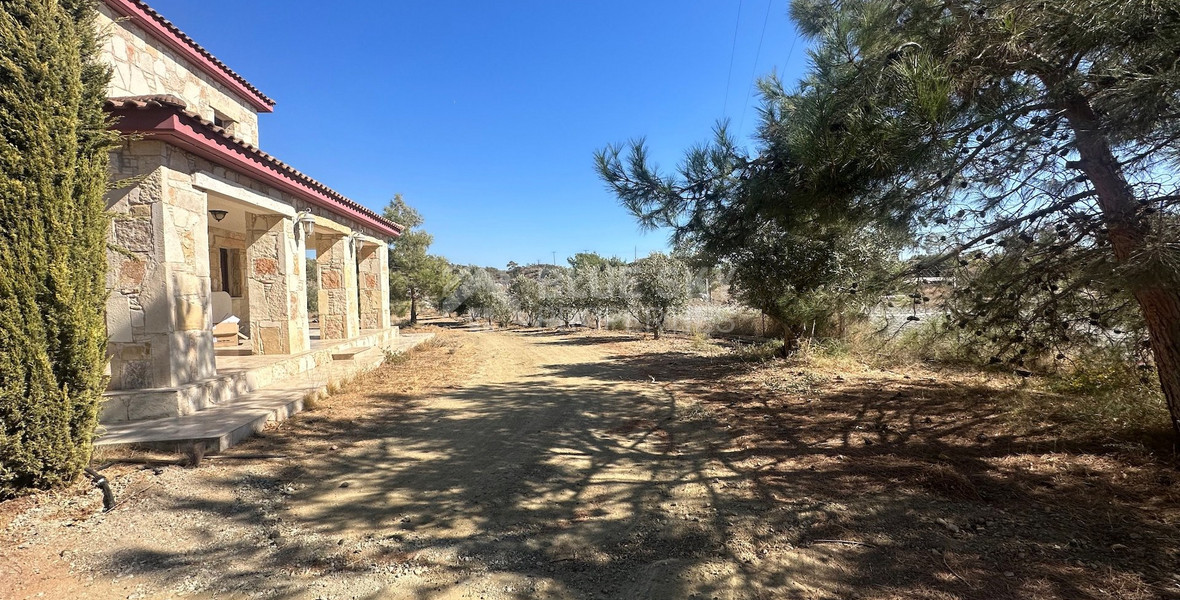 Exquisite  5 bedroom stone villa with 2 bedroom guest house  privately secluded and gated  on 13,118 sqm land in Moni.