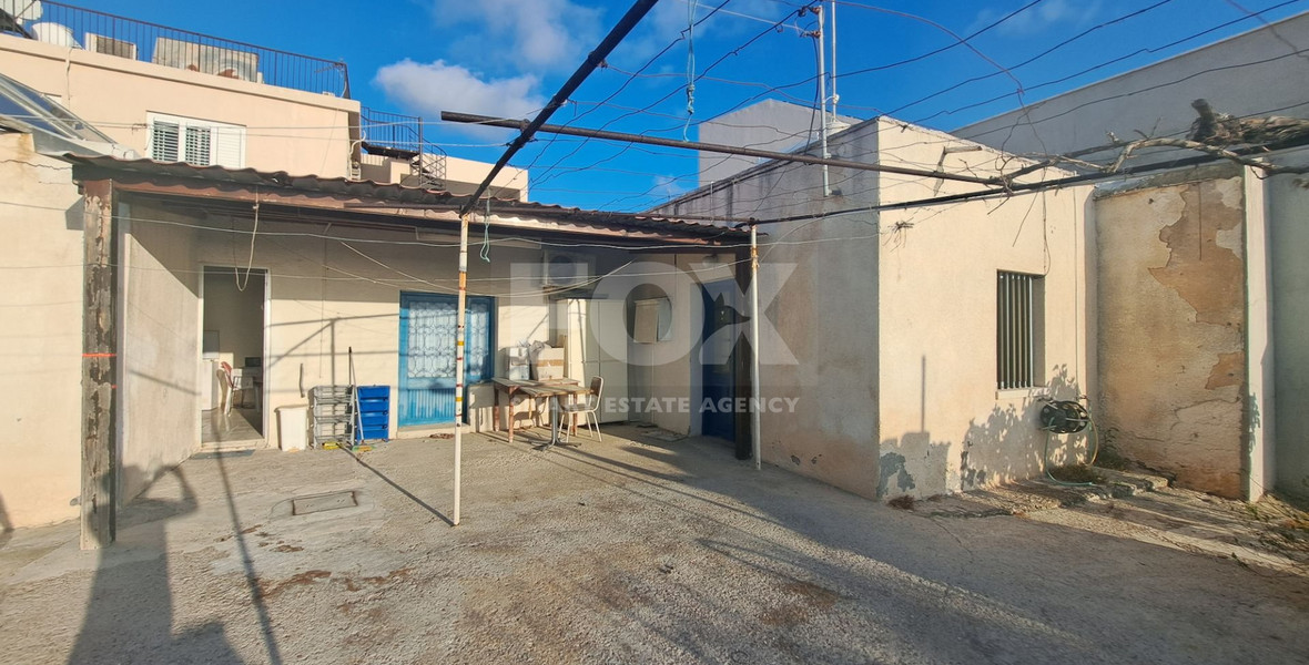 Residential plot with an old stone house