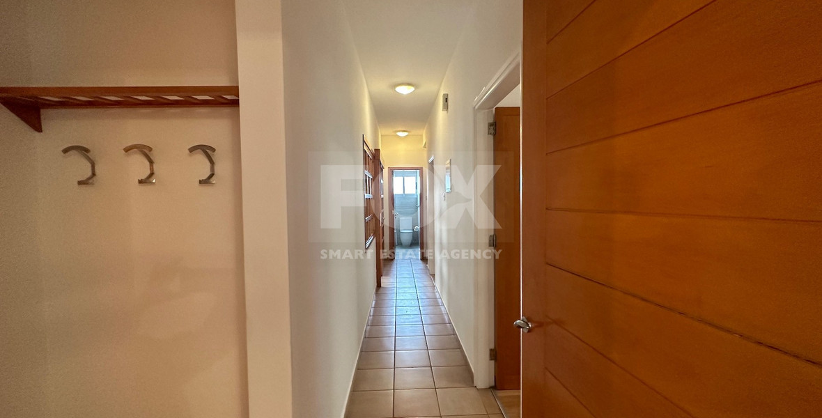 Spacious ground floor Apartment in Agia Zoni  for residential or commercial use.