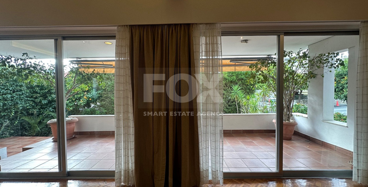 Spacious ground floor Apartment in Agia Zoni  for residential or commercial use.