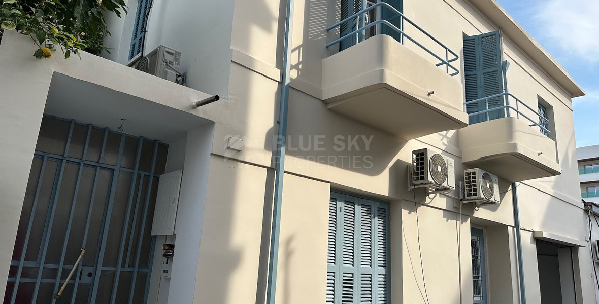 Exclusive Listing, Renovated Building offering ground level and upper level residences with garage in prime location Agia Zoni.