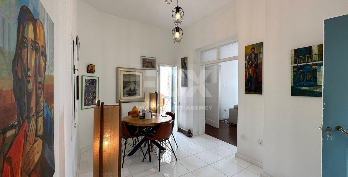 Exclusive Listing, Renovated Building offering ground level and upper level residences with garage in prime location Agia Zoni.