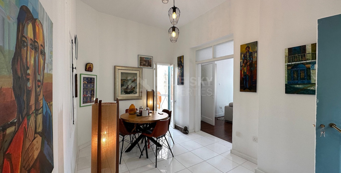 Exclusive Listing, Renovated Building offering ground level and upper level residences with garage in prime location Agia Zoni.