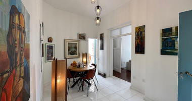 Exclusive Listing, Renovated Building offering ground level and upper level residences with garage in prime location Agia Zoni.