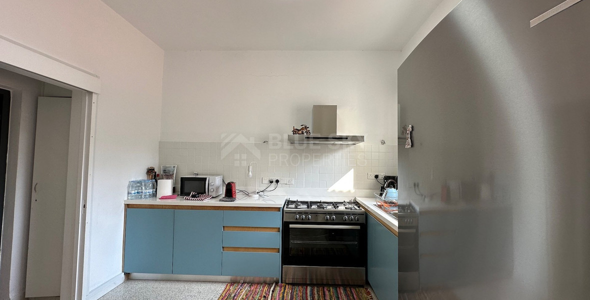 Exclusive Listing, Renovated Building offering ground level and upper level residences with garage in prime location Agia Zoni.