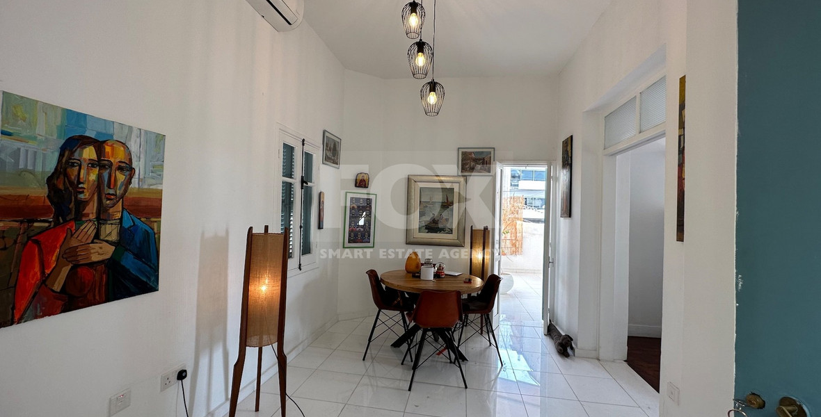 Exclusive Listing, Renovated Building offering ground level and upper level residences with garage in prime location Agia Zoni.