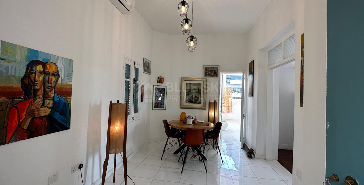 Exclusive Listing, Renovated Building offering ground level and upper level residences with garage in prime location Agia Zoni.