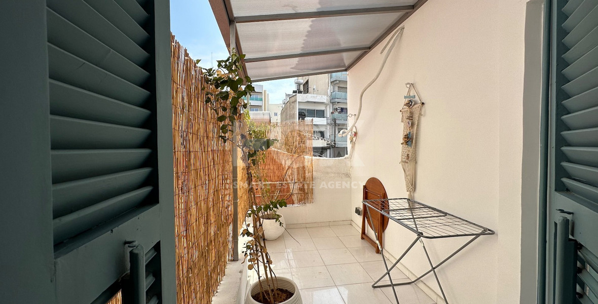 Exclusive Listing, Renovated Building offering ground level and upper level residences with garage in prime location Agia Zoni.