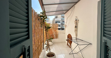 Exclusive Listing, Renovated Building offering ground level and upper level residences with garage in prime location Agia Zoni.
