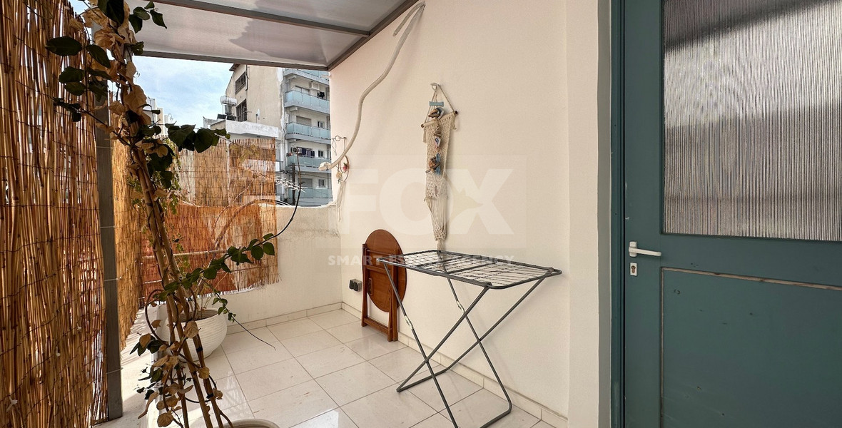 Exclusive Listing, Renovated Building offering ground level and upper level residences with garage in prime location Agia Zoni.