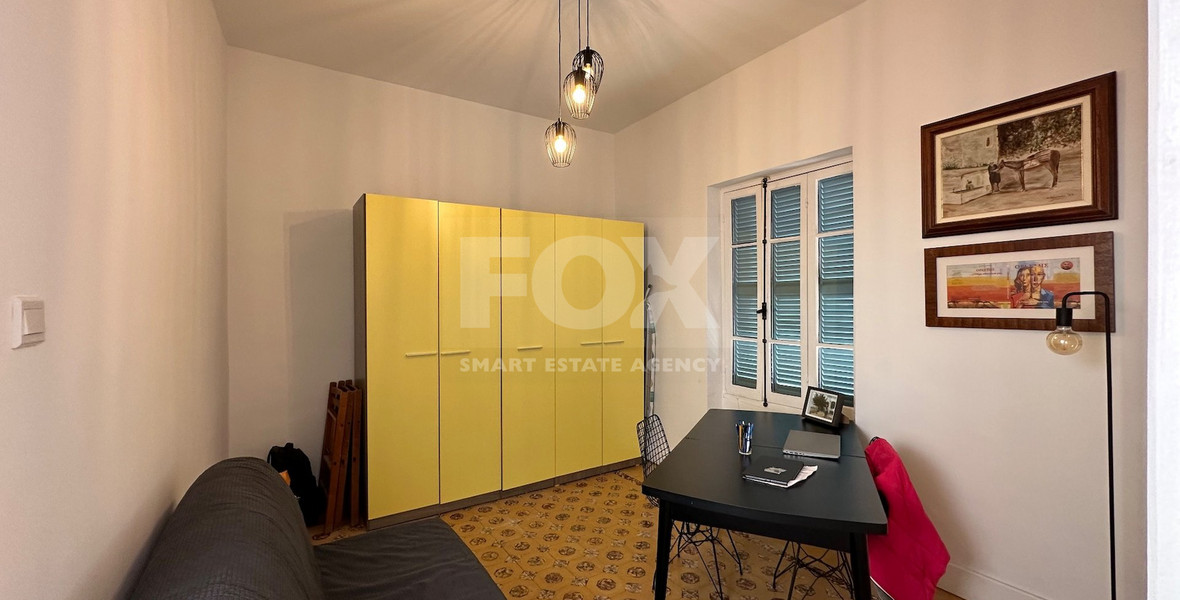 Exclusive Listing, Renovated Building offering ground level and upper level residences with garage in prime location Agia Zoni.