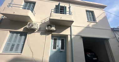 Exclusive Listing, Renovated Building offering ground level and upper level residences with garage in prime location Agia Zoni.