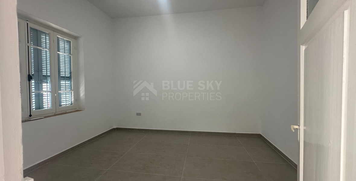 Exclusive Listing, Renovated Building offering ground level and upper level residences with garage in prime location Agia Zoni.