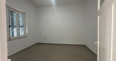 Exclusive Listing, Renovated Building offering ground level and upper level residences with garage in prime location Agia Zoni.
