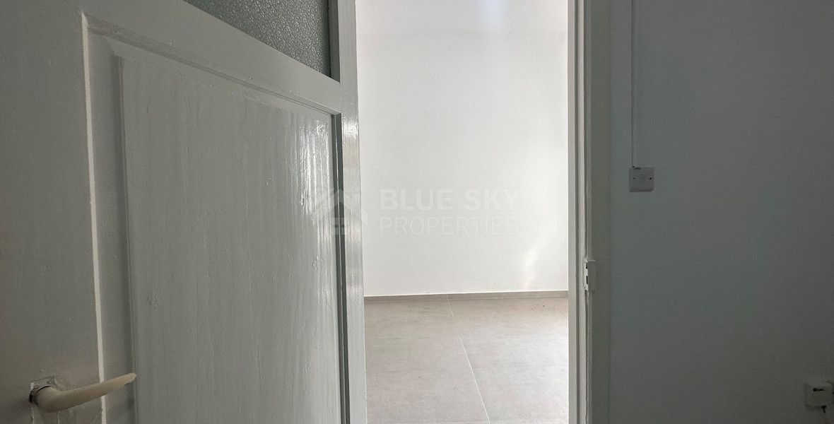 Exclusive Listing, Renovated Building offering ground level and upper level residences with garage in prime location Agia Zoni.