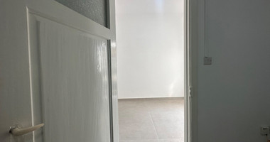 Exclusive Listing, Renovated Building offering ground level and upper level residences with garage in prime location Agia Zoni.
