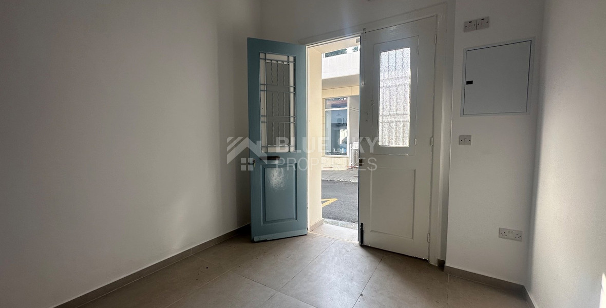 Exclusive Listing, Renovated Building offering ground level and upper level residences with garage in prime location Agia Zoni.