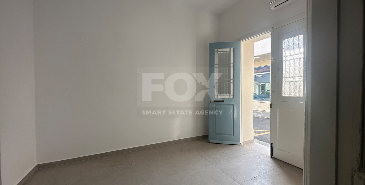 Exclusive Listing, Renovated Building offering ground level and upper level residences with garage in prime location Agia Zoni.