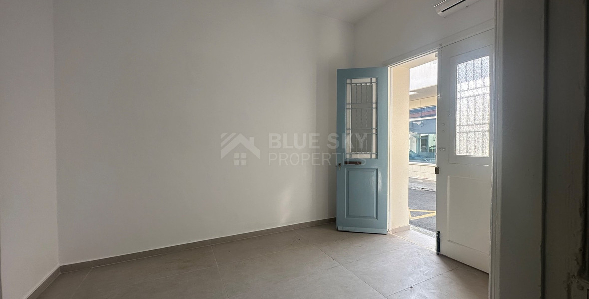 Exclusive Listing, Renovated Building offering ground level and upper level residences with garage in prime location Agia Zoni.