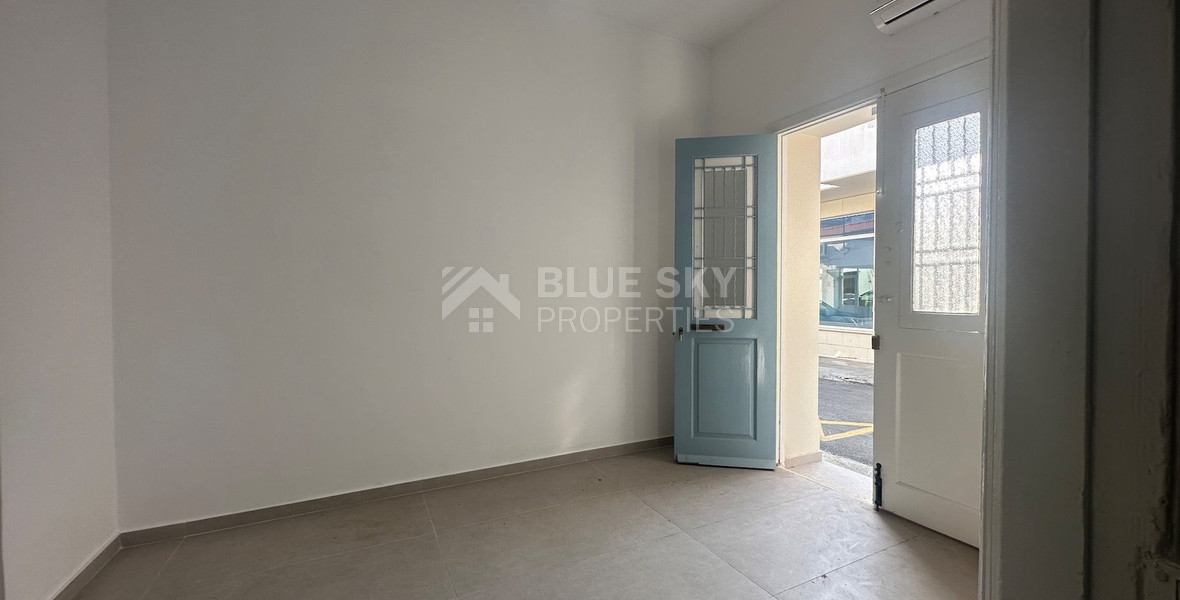 Exclusive Listing, Renovated Building offering ground level and upper level residences with garage in prime location Agia Zoni.
